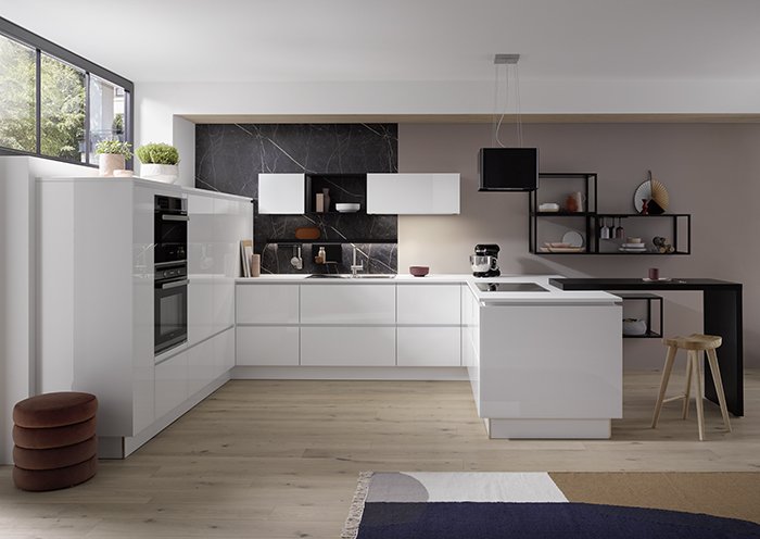 U-shaped kitchen concept with glossy white cabinetry, black feature splashback, built-in appliances and modern open shelving