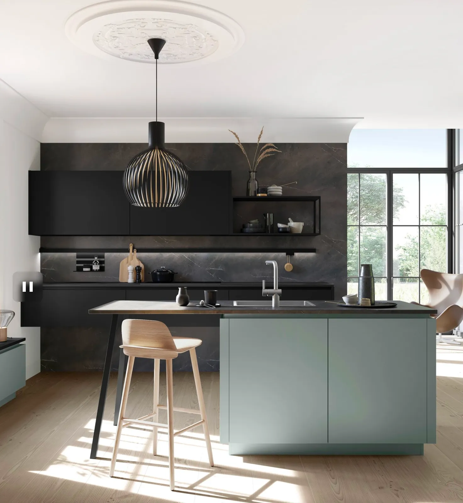 Luxury modern kitchen design with matte black accents, minimalist island, pendant lighting and natural wood flooring
